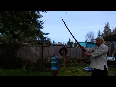 Nodachi vs large water jug. More an exlosive hit than a cut.