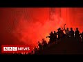Liverpool fans flock to Anfield to celebrate Premier League title - BBC News