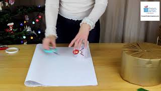 Christmas gift wrapping: how to gift wrap a round box