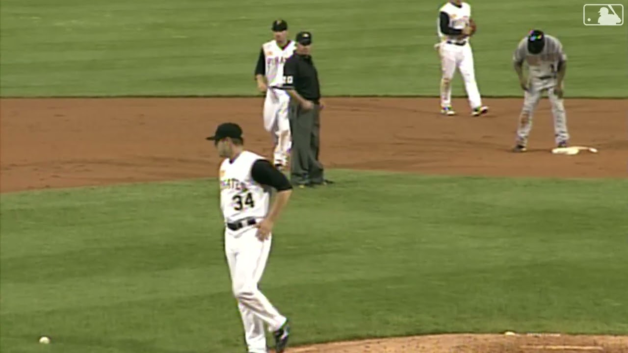 Doumit hits Grabow with throw while attempting to throw runner out