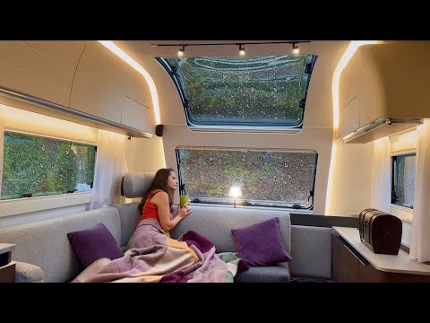 CAMPING UNDER HEAVY RAIN IN A HOME COMFORT CARAVAN WITH A STOVE