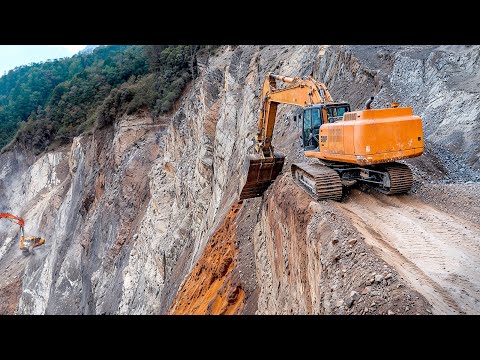 Skilled Excavator Operators Are Building Roads on a Steep Mountain ▶ 2