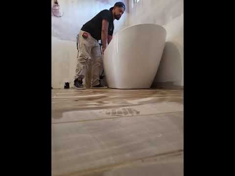 Freestanding tub installation #tiles #freestandingtub #bathroomremodeling #installation #392sx