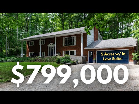 Sold! Inside this 5 acre $799,000 home, nestled amongst the trees with its own in-law suite!