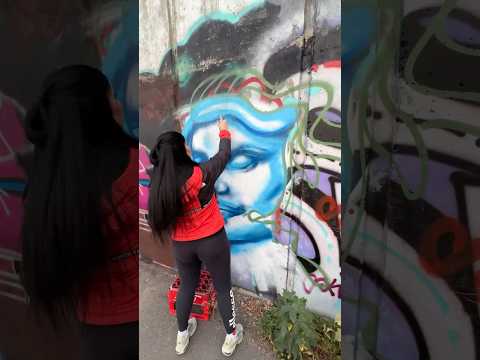 KIBI paint graffiti Gorgon Medusa on the Olympic Stadium in Kyiv