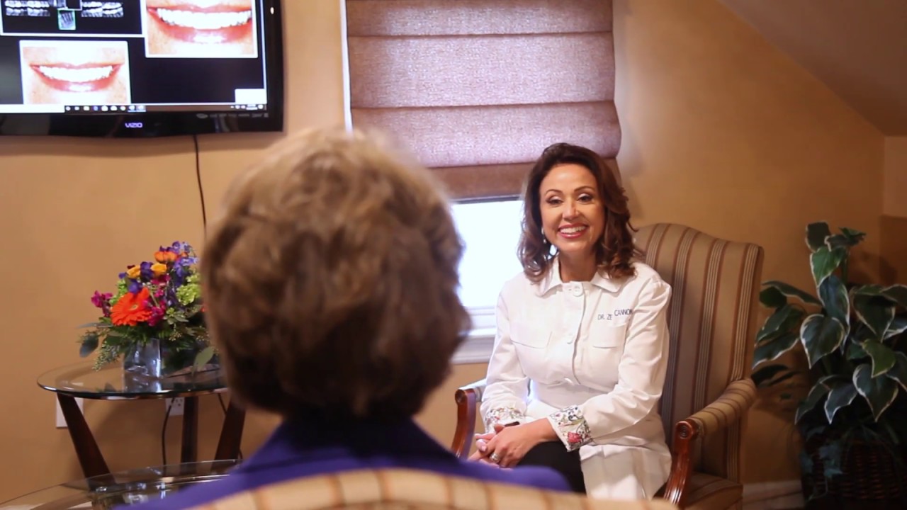 Sparta dentist sitting across from patient in dental office