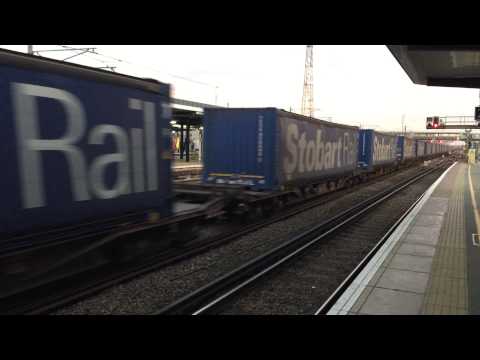 66014 passing Ashford with Stobart Rail train 4M38 Dollands Moor to Daventry, 05/03/2015