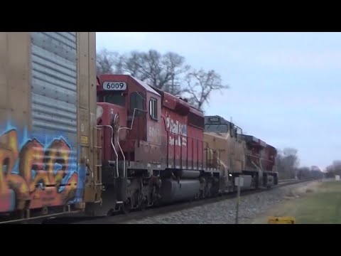 Dual Flag SD40-2 trails on CP 141 with a Horn Salute! 12/5/20