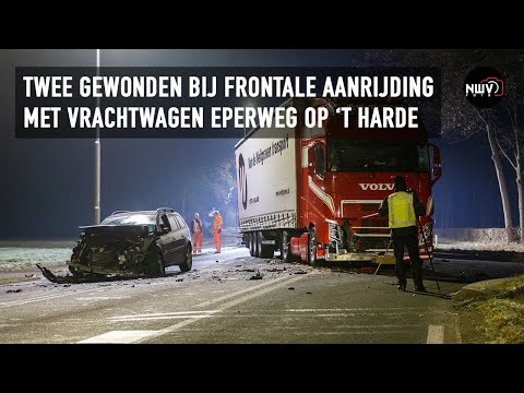 Two people injured in front-front collision between truck and car