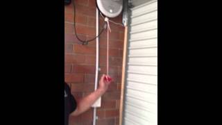 How to open & close a motorised roller door when the power is out