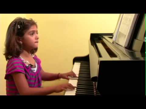 Parmis performing Jingle Bells, Sayeh Chaman, and Are You Sleeping