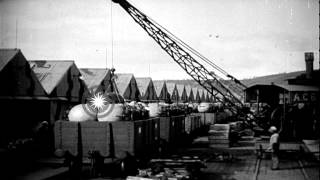 Land mines being pulled aboard a ship underway in the Atlantic Ocean during World...HD Stock Footage