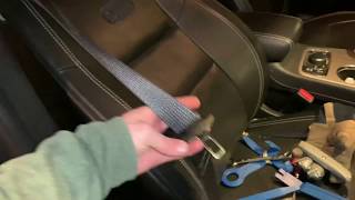 Seat belt stuck, Cheapskate fix for 2015 Jeep Grand Cherokee... seat belt now retracts.