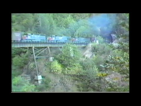 902. SOUTHERN PACIFIC SP 7330 west between Tunnel # 7 and # 8 on September 5 1986 with 8 freight en