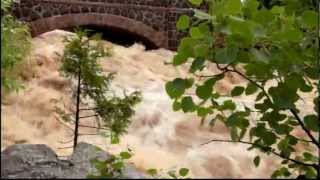 preview picture of video 'Amity Creek, Lester Park: Rapids Shooting under 2nd Bridge, Duluth Flood 2012 V1501E'