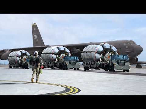 US Loading B-52 Bomber with Gigantic Rotary Missile Launchers