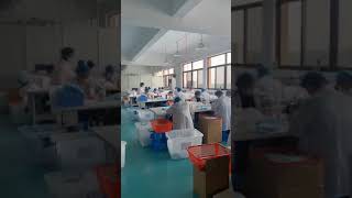 Fleet's Partners Busy at Work Making Mask.