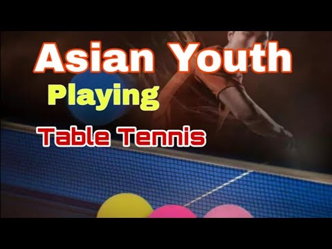Asian Youth Playing Table Tennis