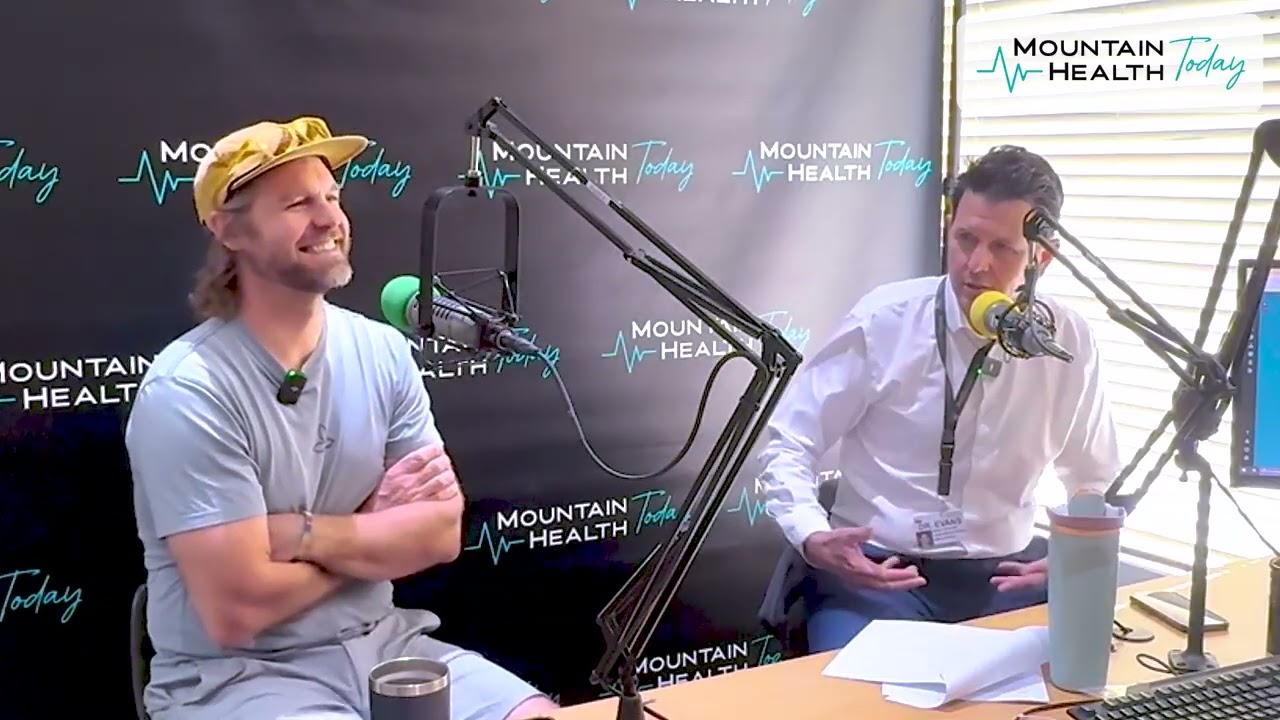 Dr. Brian Evans, Chief Medical Officer, and Dr. Jeffrey Fountain, Medical Director of Radiology, speaking into microphones in the Mountain Health Today podcast studio
