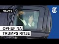 Besmette Trump maakt ritje langs aanhangers