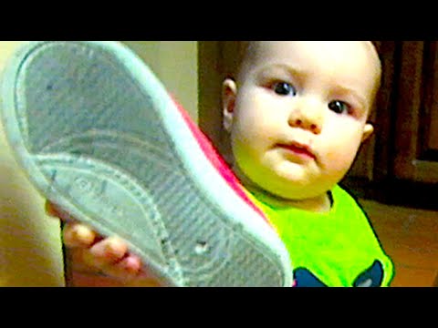 1 YEAR OLD TRYING TO PUT ON SHOES Video