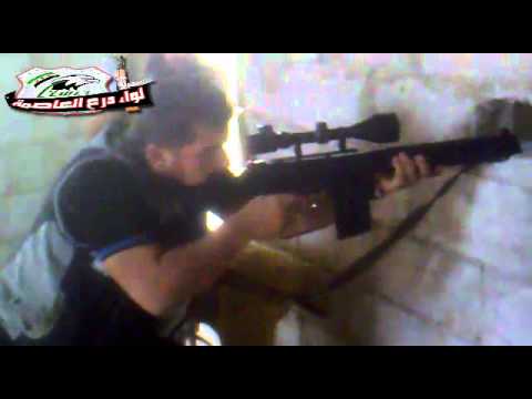 استهداف قناصي كتيبة الخلفاء الراشدين التابعة للواء درع العاصمة أحد جنود النظام على مبنى مشفى الشرطة في مدينة حرستا في ريف دمشق