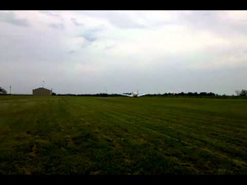 A36 landing on grass.