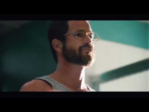 Rapid-cut trailer montage: backyard barbecue, suburban kitchen, staircase chase — music toggles from bright to bleak