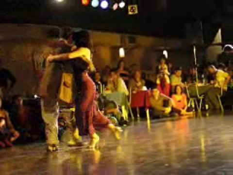  Rafael Mendaro  and  Lorena Mosele  are  dancing  to  the  tango  "  Tu...el Cielo Y Tu!  "