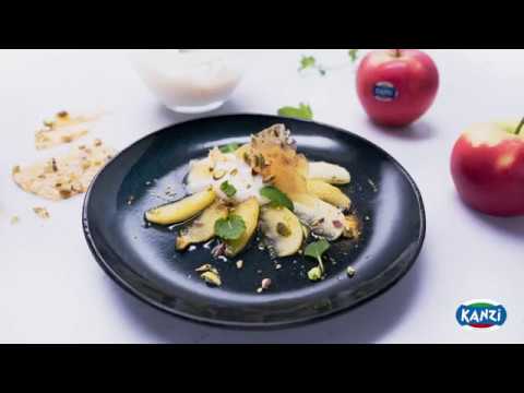 KARAMELLISIERTE APFELSPALTEN MIT ZITRONEN-RICOTTA UND PISTAZIENKROKANT - Rezept