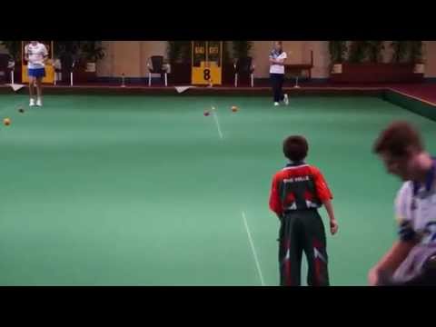 Eight-year-old Joshua Cotton playing in South Pacific Under 16 lawn bowls