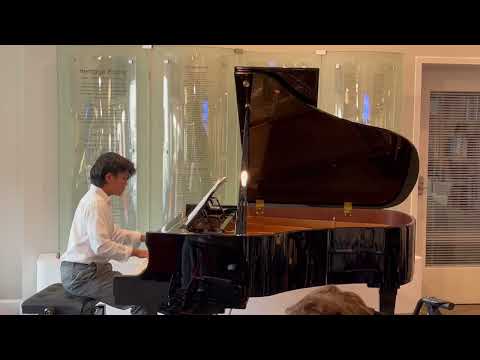 Nicholas Pantangco performs "Autumn" by Cecile Chaminade for residents residing at Heritage Pointe.