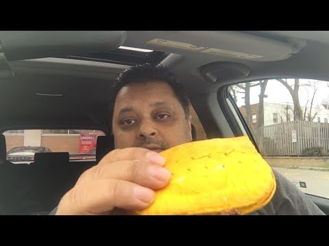 Eating Golden Crust Jamaican Patties