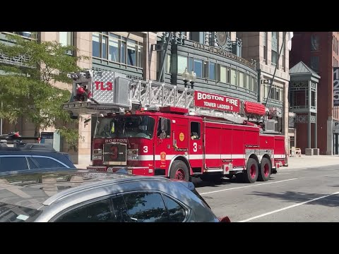 Boston Tower Ladder 3 and Engine 10 responding to car accident with reported injuries