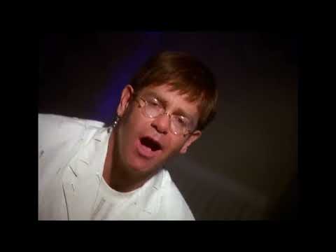 Elton John performing Can You Feel the Love Tonight