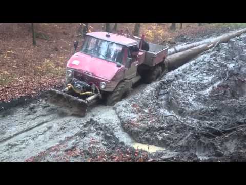 Mercedes Unimog pull heavy logs