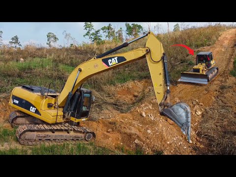 Excavator vs. Bulldozer: Power in Action on a Tough Terrain!