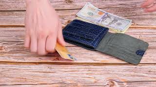 Стильне портмоне для чоловіків у два складення з натуральної фактурної шкіри з тисненням під крокодила Canpellini 21577 синє