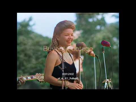 Frances Langford and Tony Romano in U.S.O. tour, entertain U.S. troops on Bougainvi