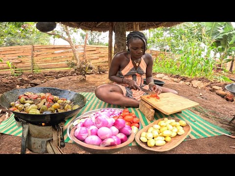 African Village Girl Cooks Delicious meal For Lunch