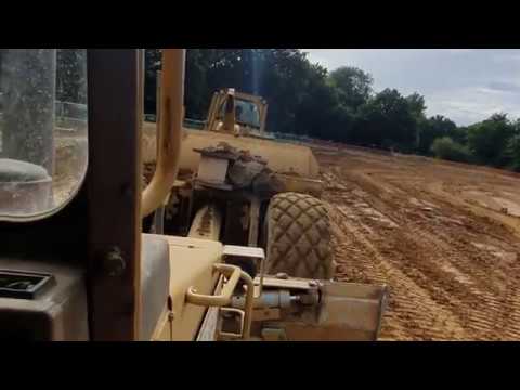 Cat D6 and box in action, and D4 push loading