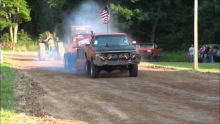preview picture of video 'REMUS TRUCK PULLS  MODIFIED GAS TRUCKS PART ONE  07-18-14'
