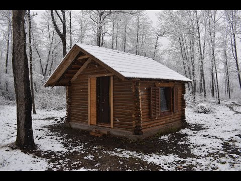 Walking To My Off Grid Log Cabin During Snow