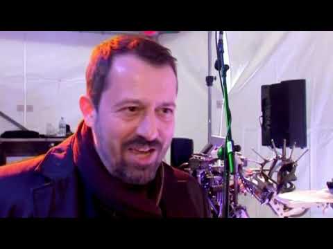 78-finger robot plays guitar in rock band