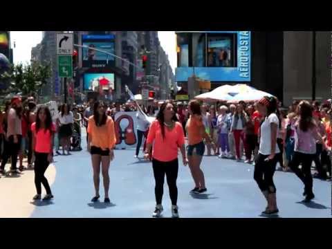Life Vest Inside Flash MOB - Times Square - Wavin' Flag by K'naan