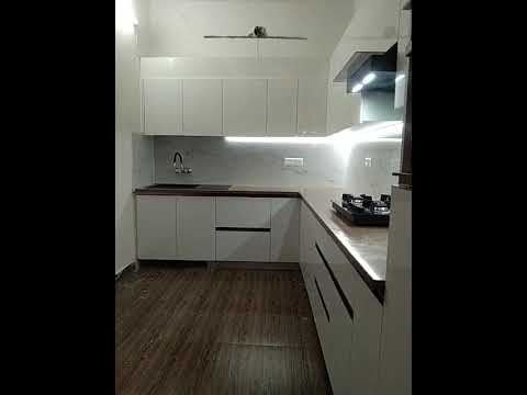 Modular kitchen by Falak Interior Decorator.