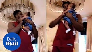 Tristan Thompson on daddy duty dancing with baby True Thompson