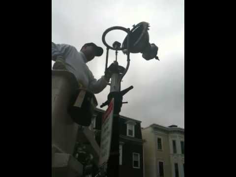 Maintaining gaslights, Charlestown MA