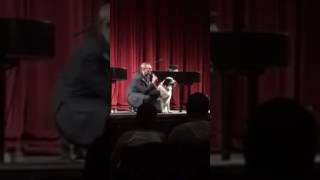 Yoshi helps Raue Center Board President introduce Felix and Fingers Concert