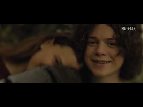 Official Netflix trailer thumbnail for The Electric State with Millie Bobby Brown and a friendly robot against a retro-futurist sky